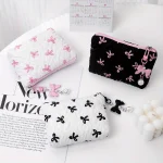 Trousse de maquillage à nœud brodé, niveau d&rsquo;apparence élevé, sac de rangement pour porte-monnaie, mignon, grande capacité, trousse de maquillage haut de gamme