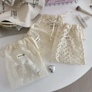 Sacs à cordon brodés en dentelle en maille, sac à cordon imprimé marguerite, organisateur de soins de la peau de voyage, sac anti-poussière pour bijoux, sacs à cordon