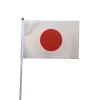 drapeau japonais à main 14*21cm, décoré avec un mât en plastique, utilisé pour les défilés de vacances
