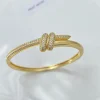 bracelet de mode européenne et américaine micro incrusté zircon double couche enveloppé personnalité petit bracelet torsion noué bracelet