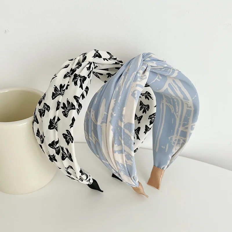 Version coréenne de la mode nouveau cerceau de cheveux tissu imprimé accessoires de cheveux à large bord cerceau de tête accessoires de tête de conception simple Version coréenne de la mode nouveau cerceau de cheveux tissu imprimé accessoires de cheveux à large bord cerceau de tête accessoires de tête de conception simple