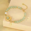 bijoux fins style anniversaire cadeau zodiaque dragon décoration hotan jade bracelet lumière luxe sens avancé pour les femmes