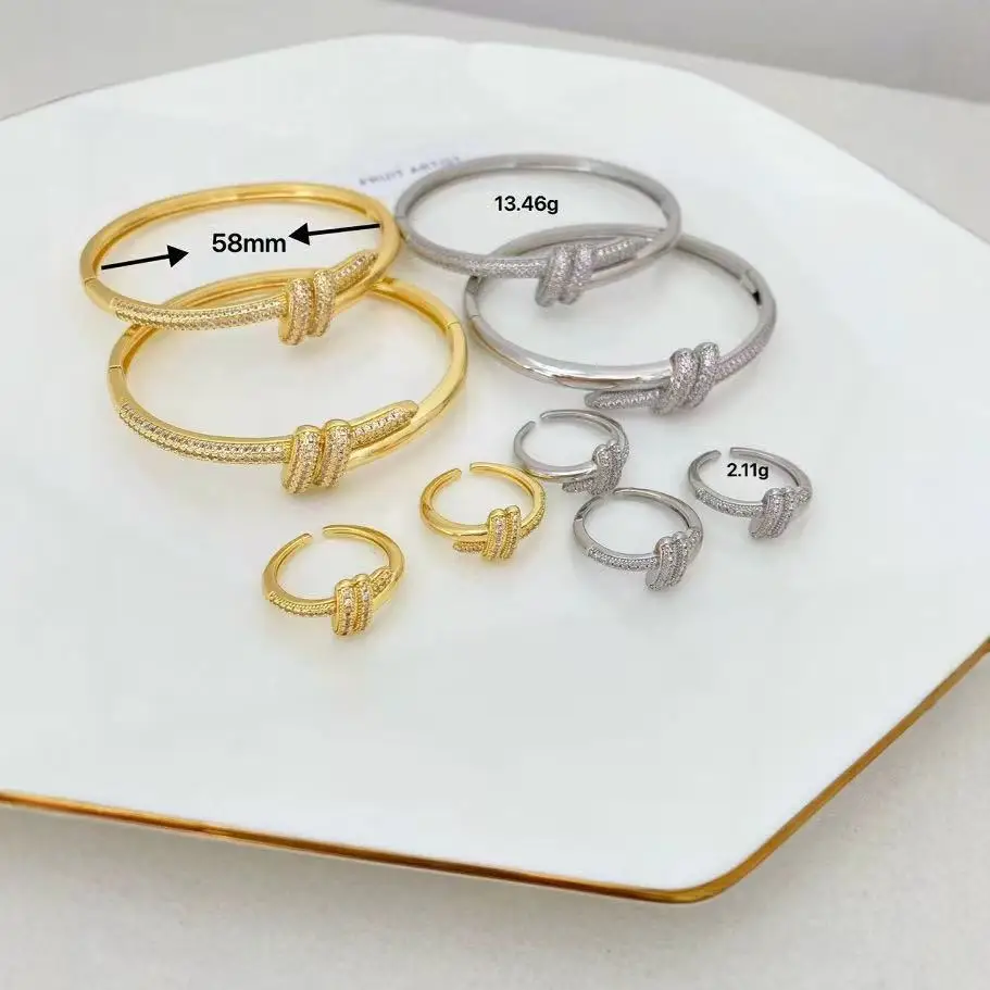 bracelet de mode européenne et américaine micro incrusté zircon double couche enveloppé personnalité petit bracelet torsion noué bracelet bracelet de mode européenne et américaine micro incrusté zircon double couche enveloppé personnalité petit bracelet torsion noué bracelet