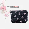 trousse de maquillage à nœud brodé, niveau d'apparence élevé, sac de rangement pour porte monnaie, mignon, grande capacité, trousse de maquillage haut de gamme