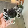 ruban noir, petit nœud à carreaux parfumé, broche à pampilles en perles de camélia, broche à nœud papillon deuil noir