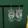 boucles d'oreilles vintage en métal couleur argent, hibou sculpté, rondeur d'originalité incrustée, pierre bleue de mer