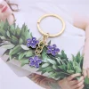 tendance mignon émail porte clés coloré sakura fleur porte clés doux porte clés pour femmes filles sac à main accessoires bijoux à bricoler soi même