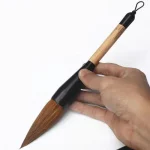 Grand pinceau de calligraphie, stylo chinois, belette, loup, laine, ours, cheveux, grand caractère, brosse d’écriture pour Couplets du Festival du printemps Grand pinceau de calligraphie, stylo chinois, belette, loup, laine, ours, cheveux, grand caractère, brosse d’écriture pour Couplets du Festival du printemps