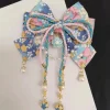 fille de style japonais avec estampage à chaud, accessoire pour cheveux avec nœud en fleurs de cerisier, clip de bord à pampilles lolita