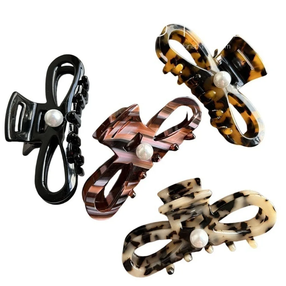 Épingle à cheveux design français femmes griffes de cheveux ornement de cheveux perle queue de cheval pinces à cheveux léopard rétro dame requin pince pour filles chapeaux Épingle à cheveux design français femmes griffes de cheveux ornement de cheveux perle queue de cheval pinces à cheveux léopard rétro dame requin pince pour filles chapeaux