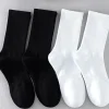 chaussettes de sport en coton unisexe, douces, confortables, respirantes, décontractées, noir et blanc, tube moyen, couleur unie, pour hommes et femmes, chaussettes classiques