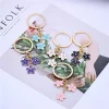 tendance mignon émail porte clés coloré sakura fleur porte clés doux porte clés pour femmes filles sac à main accessoires bijoux à bricoler soi même