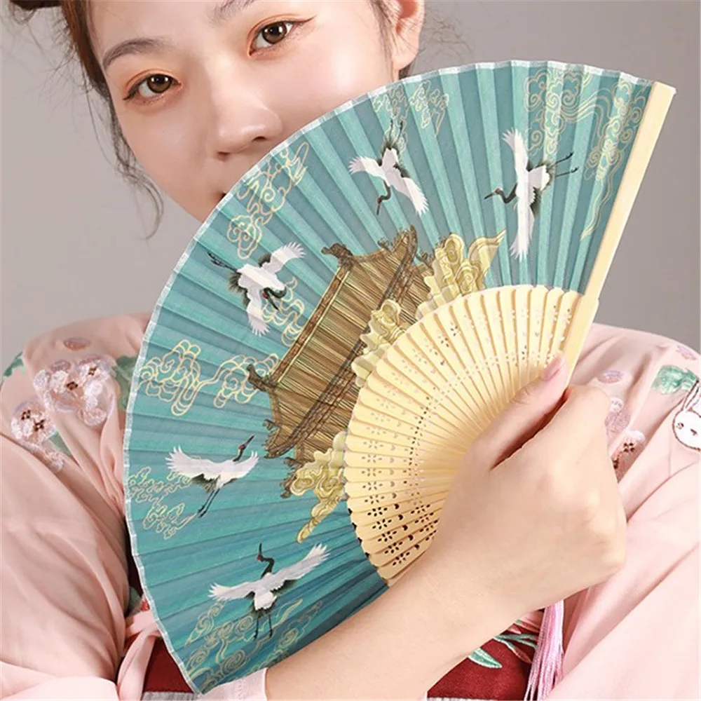 Éventail à main en bambou pliant de style prairie chinoise, hanfu, performance de danse pour étudiants, cadeau, longue poignée, pompon, petit, rond Éventail à main en bambou pliant de style prairie chinoise, hanfu, performance de danse pour étudiants, cadeau, longue poignée, pompon, petit, rond