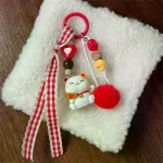 Porte-clés en forme de boule de fourrure rouge, chat porte-bonheur, mignon et amusant, pendentif, chaîne de téléphone, sac, ornement suspendu, sac à dos, breloques, accessoire cadeau