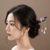 Épingle à cheveux rétro en bois de santal, pompon, épingle à cheveux de style chinois, accessoires pour cheveux de fille de style ancien, couvre chef hanfu pour femmes