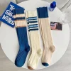 Femmes nouveaux bas japonais hiver épaissir chaud court coton décontracté multicolore rayé chaussettes cuisse haute chaussettes pour les femmes