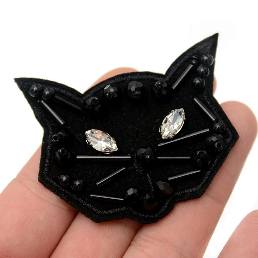 perles faites à la main tête de chat strass fleur vêtements accessoires bricolage cousu à la main chaussures et chapeaux sac patch autocollants perles faites à la main tête de chat strass fleur vêtements accessoires bricolage cousu à la main chaussures et chapeaux sac patch autocollants