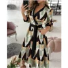 Robe portefeuille à ceinture pour femme, vente chaude, coupe ample, imprimé multi-motifs, adaptée aux transitions saisonnières Robe portefeuille à ceinture pour femme, vente chaude, coupe ample, imprimé multi-motifs, adaptée aux transitions saisonnières