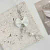 chaîne de téléphone portable avec nœud pour fille, nouveau style ins japonais et coréen, sac perlé fait à la main, porte clés de voiture suspendu, pendentif de sac pour carte d'appareil photo