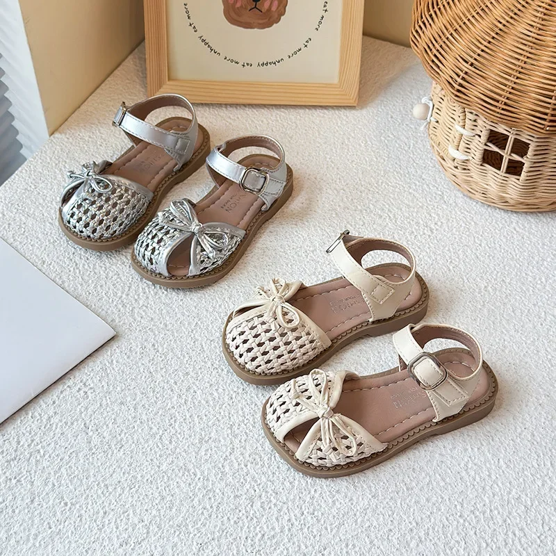 sandales pour enfants tissage nœuds simples filles chaussures de princesse ins à la mode décontracté 2025 été nouveaux enfants chaussures de plage évidé ins sandales pour enfants tissage nœuds simples filles chaussures de princesse ins à la mode décontracté 2025 été nouveaux enfants chaussures de plage évidé ins